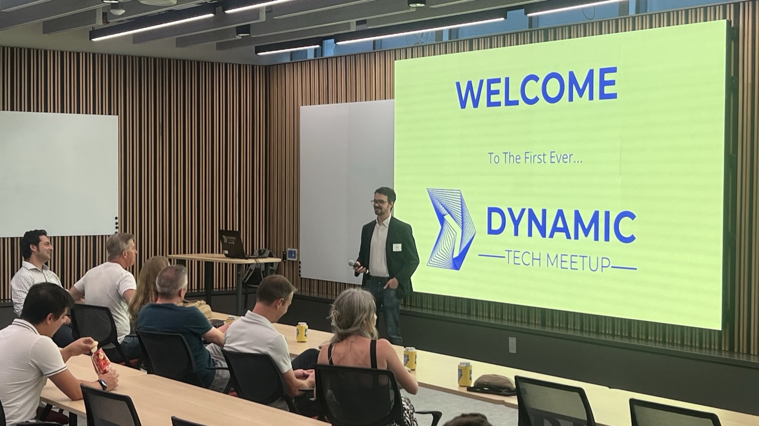 John welcoming the room to the first-ever Dynamic Tech Meetup, with a full audience.