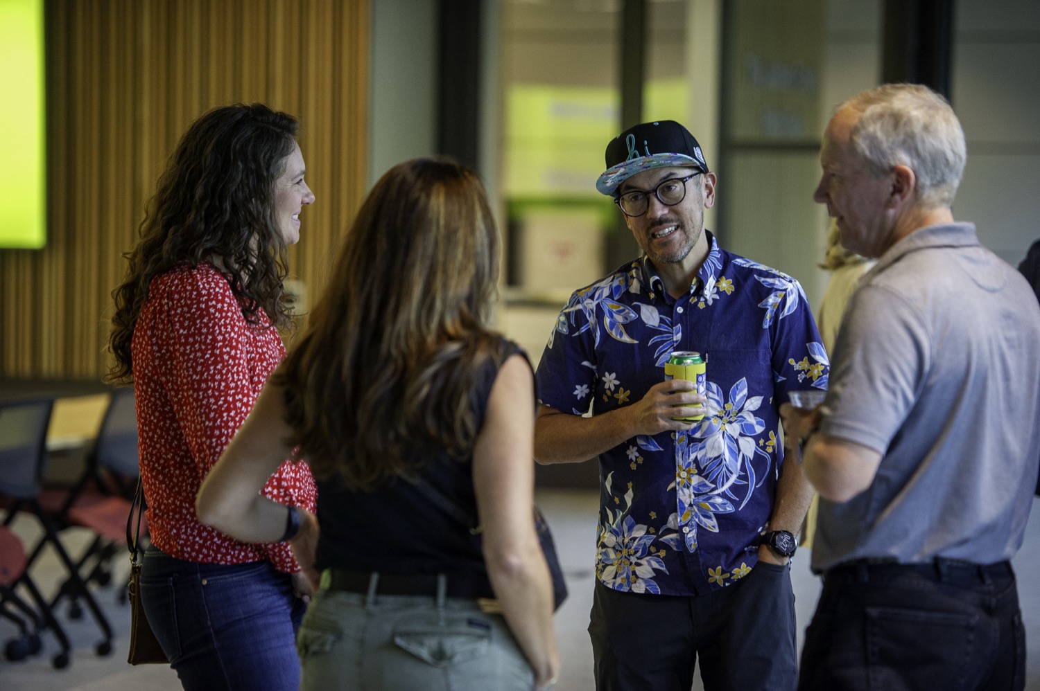 Guests connecting over drinks at the Dynamic Tech Meetup.