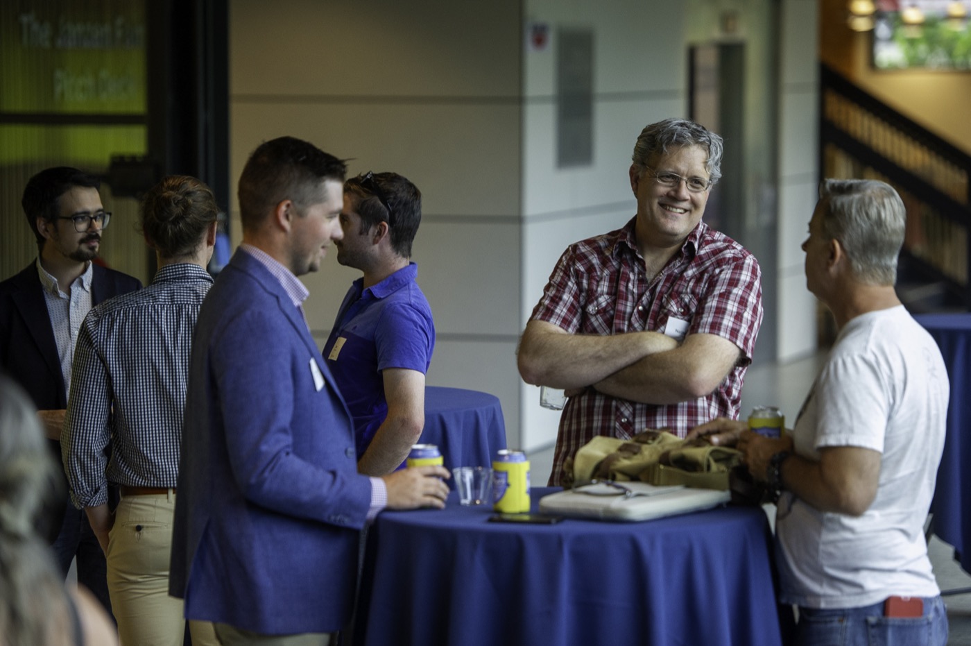 Guests networking over drinks.
